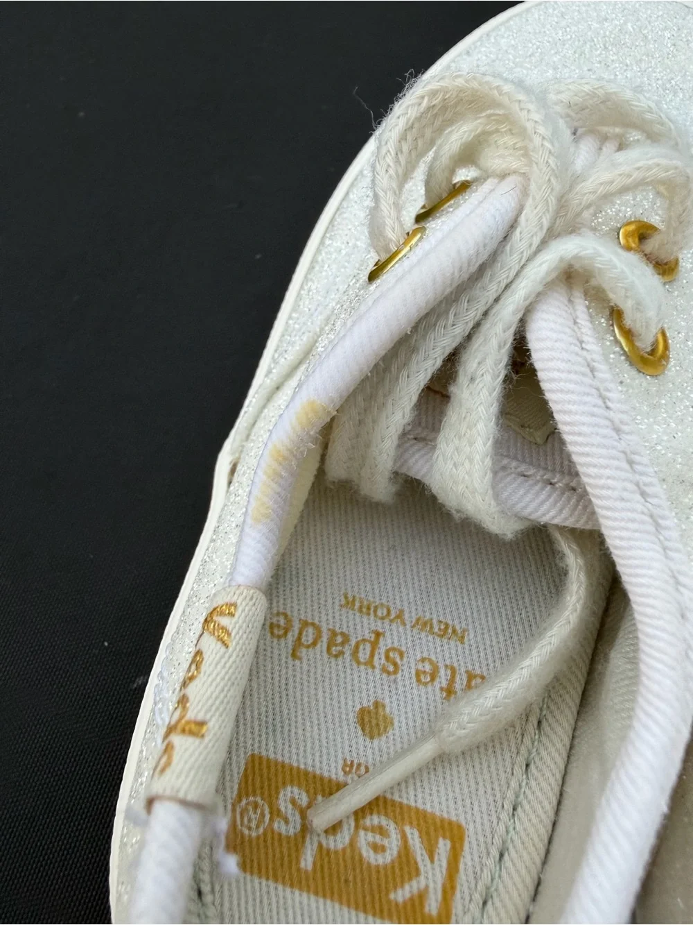 kate spade Kids Glitter Canvas Sneakers in White with Gold Eyelets